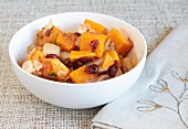 Roasted butternut squash with dried cranberries and sweet onions