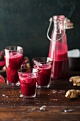 Beetroot juice in a bottles and glasses