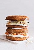 Sesame seed bagels with salmon, bean sprouts and cream cheese