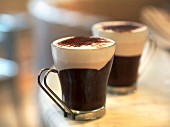 Bicerin (a hot drink made from espresso, cocoa and whole milk) into glass cups