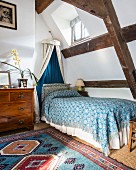 Half-timbered bedroom with opulent decor