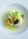 Scallop soup with caviar, leek and carrots