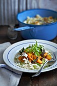 Rice with pumpkin, feta cheese and rocket