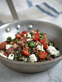 A lentil medley with peas, bacon and feta cheese
