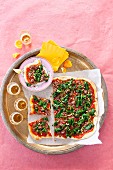 A minced meat, spinach and pine nut pizza (Lebanese)