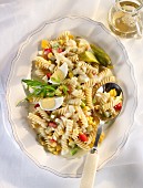 Pasta salad with hard-boiled eggs and diced vegetables