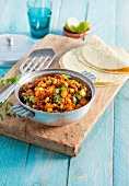 Picadillo (minced meat dish from Latin America) with olives and raisins