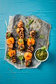 Grilled skewers with duck breast and persimmons