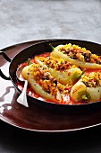 Stuff pointed peppers with raisins, feta cheese and mint