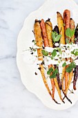 Roasted vegetables with yoghurt sauce (seen from above)