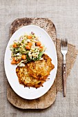 Potato fritters with a savoy cabbage medley