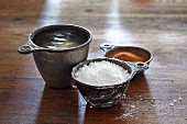 Water, cornstarch and spices in bowls
