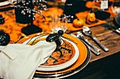 Halloween place setting on decorated table