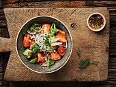 Thai salad with salmon, tomato and nuts