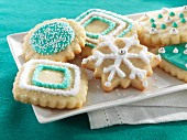 Christmas biscuits decorated with turquoise and white icing