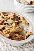 Bread and butter pudding with bananas and raisins