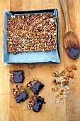 Dried fruit and nut bars with honey and dark chocolate glaze