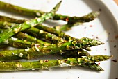 Fried asparagus with Parmesan cheese and chilli flakes