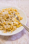 Pasta with cheese and ground black pepper