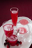 Homemade cranberry jelly in various glasses