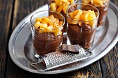 Chocolate mousse with biscuits and persimmons