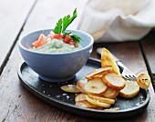 A creamy vegetable dip with fried potatoes