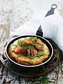 Spanish tortilla with tomatoes and chives
