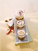 Cafe latte with chilli and cardamom, almond espresso, and coffee with coconut cream and vanilla ice cream