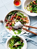 Mixed leaf salad with grapes, red onions and a dressing