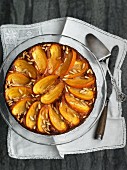 Persimmon cake with pine nuts