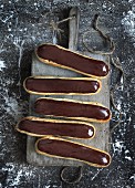 Eclairs with chocolate sauce