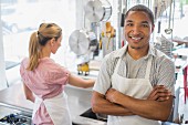 Two people in a commercial kitchen