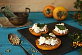 Persimmon with ricotta, walnuts and sage