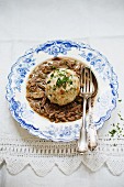 Saure Lunge (Bavarian ragout made with veal lungs) served with a bread dumpling