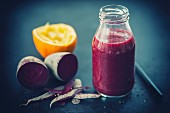 A beetroot smoothie with oranges