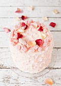 A Turkish Delight layer cake with rose petals