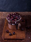 Blackberries in a glass cup