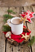 A mug of hot chocolate with star-shaped sables (Christmas)
