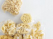 Various types of pasta in plastic bags