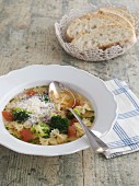 Minestra with broccoli and coralli (vegetable soup with pasta, Italy)