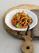 Strozzapreti with tomatoes, courgette and basil