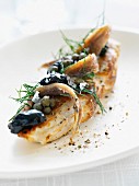 Chicken breast with anchovies, capers and dill