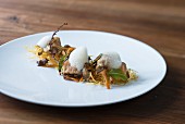 Veal sweetbread with chanterelle mushrooms and potato straw