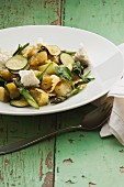 Farfalle with green tomatoes, courgette and asparagus