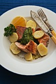Salmon with green sauce and new potatoes