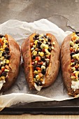 Stuffed sweet potatoes with sweetcorn and beans