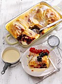 Cream strudel with redcurrants and blackcurrants