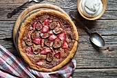 Homemade strawberry and fig tart with whipped cream