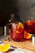 A negroni with roasted oranges and spices