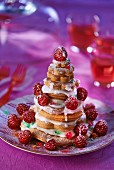 Piece Montee (French celebration cake) with raspberries